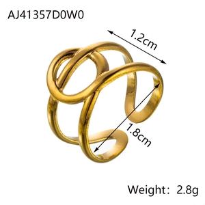 Detail of hollow star and heart gold ring showing 1.2cm width and 2.8g weight specs