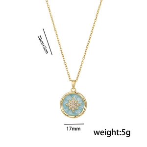 Gold starburst shell pendant necklace with blue enamel and dimensions 20cm+5cm 17mm 5g