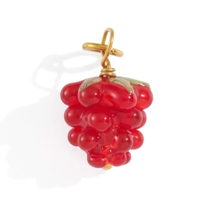 Close-up of red grape fruit pendant charm with 18K gold plated metal hanging loop
