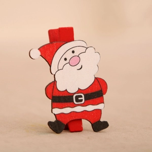 Close-up of a Santa Claus wooden clip for Christmas photo wall and gift decoration