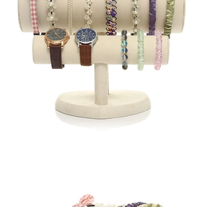 Close-up detail of double-tier velvet headband holder showing soft beige fabric texture