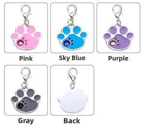 Detail view of paw shaped pet tags with sparkling rhinestones in four assorted colors