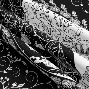 Detailed close-up of high-quality polyester tree of life tapestry with black and white vines