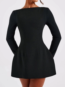 Detailed close-up showing the tailored waistline and fit of the black long sleeve mini dress