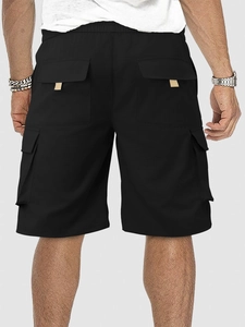 Rear view of men's black cargo shorts featuring multi-pockets and an elastic waistband