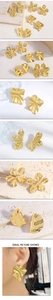 Detailed view of gold stainless steel earrings with irregular hammered flower textures