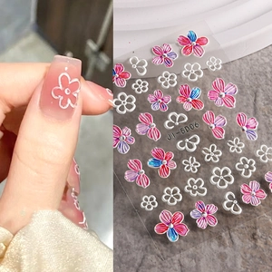5D embossed nail art stickers with pink camellia floral patterns and gradient petals