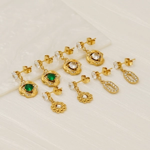 Crossed zircon earrings with green rose and daisy floral designs in gold finish