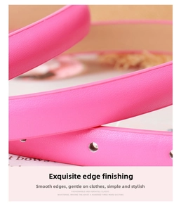 Detail of pink leather belt with smooth oil edge craftsmanship and refined grain texture