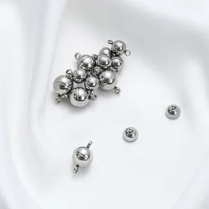 Macro view of polished stainless steel magnetic ball clasps for jewelry making