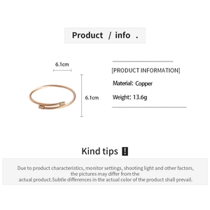 Detail showing copper rose gold twisted rope bracelet dimensions 6.1cm and 13.6g weight