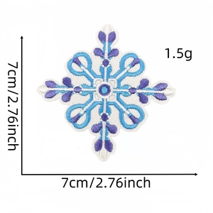 Detail view of snowflake embroidery patch showing blue and purple stitching and 7cm size