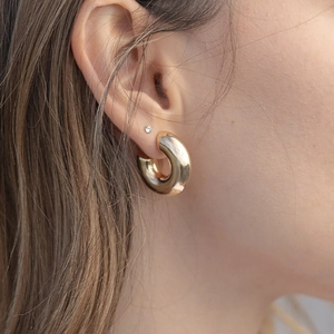Polished gold hollow hoop earrings for women made of premium stainless steel