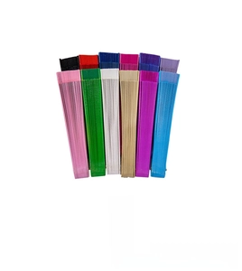 Flat lay display of colorful minimalist wooden folding fans in multiple vibrant color options