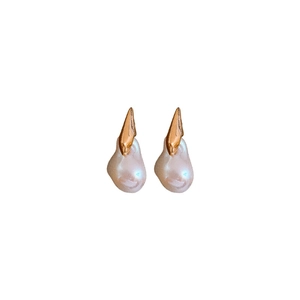 Elegant gold-plated silver needle earrings with irregular teardrop pearls on a white background