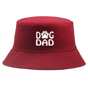 Classic red cotton bucket hat with white Dog Dad print and paw icon for outdoor wear