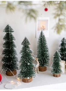Miniature flocked Christmas trees with snow effect and wooden base for festive table decor