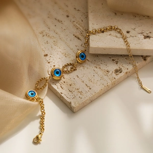 Gold stainless steel evil eye charm bracelet with blue beads in bohemian style