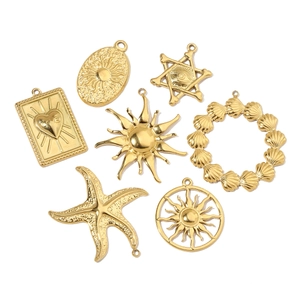 Collection of golden sun, starfish, heart, and shell pendants for DIY jewelry design