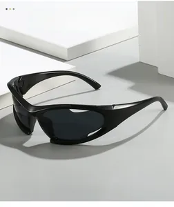 Detail of black sporty wrap-around sunglasses on a white geometric display stand