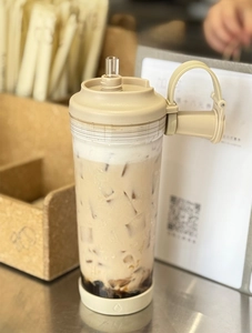 Detail view of Triton boba cup showing the large diameter straw for tapioca pearls