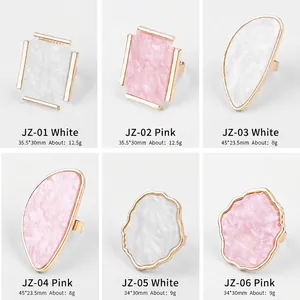 Golden shell-texture nail art palette rings in assorted rectangular and wavy shapes