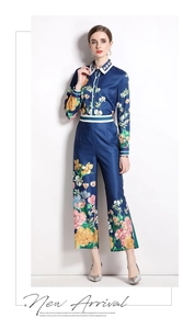 Detail of navy floral long sleeve shirt and wide leg trousers set with white contrast trim