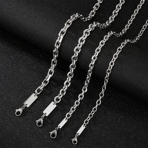 Detail of four stainless steel O-chains and box chains with lobster clasps in silver