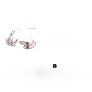 Macro view of silver C-shaped drop earrings with dimensions 2cm x 2.5cm and crystal detail