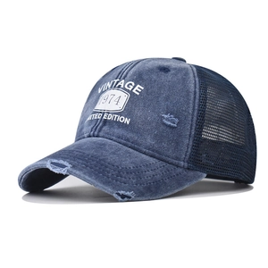 Casquette trucker bleue vintage 1974 en coton avec maille respirante et effet usé