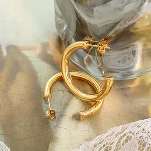 Minimalist thick hollow C-shaped hoop earrings in 18K gold plated stainless steel