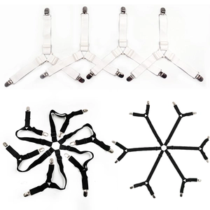 Adjustable sheet fasteners in black and white with elastic straps and metal clips