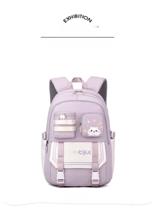 Front detail of lavender purple school backpack with cute cat print and buckle pockets