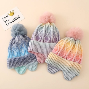 Fleece-lined tie-dye gradient knit hats for kids with ear flaps and fluffy pom-poms