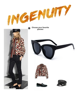 Cat eye sunglasses styled with leopard jacket and leather cap for a retro fashion look