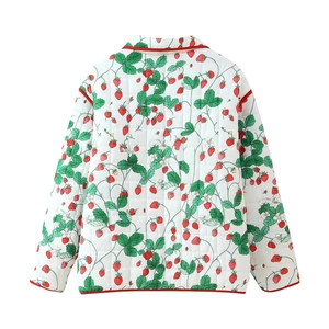 Women's quilted white jacket with red strawberry print and contrast red piping, back view