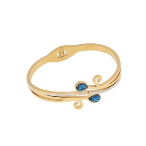Golden open bangle with blue teardrop stones and micro-pave crystals in 45-degree view