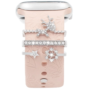 Close-up of reindeer and snowflake silver charms on pink floral silicone watch band
