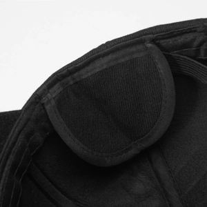 Detailed macro view of the inner black twill fabric stitching and padding of the baseball cap