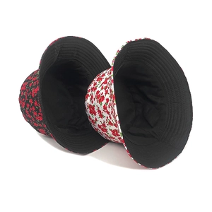 Reversible floral bucket hat for women and men in black and white flower patterns