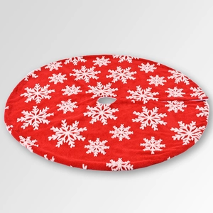 Detail of red plush Christmas tree skirt featuring white 3D snowflake patterns and soft texture