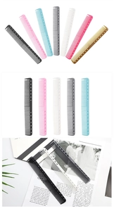 Collage showing a variety of colorful wide and fine tooth barber combs for hairstyling