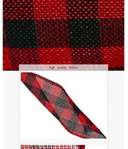 Detailed macro view of red and black buffalo plaid ribbon fabric with high quality weave