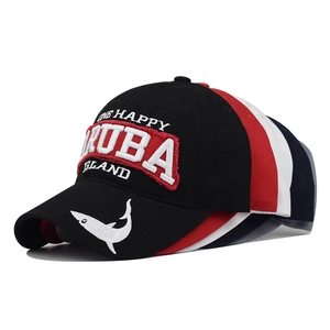 Detail of embroidered Aruba Island lettering on a multi-color paneled baseball cap