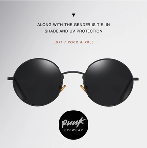 Detailed front view of punk style round sunglasses with gold nose pads and UV protection
