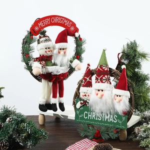 Christmas wreath set with Santa and snowman figures on natural rattan rings for wall decor