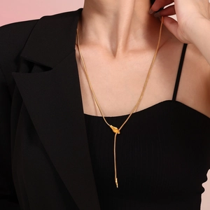 Golden snake head pendant necklace for women in minimalist chic stainless steel style