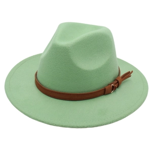 Detailed texture of light green wool felt fedora with brown leather belt buckle detail
