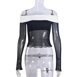 Detail of contrast off-shoulder top featuring black mesh sleeves and white elastic neckline