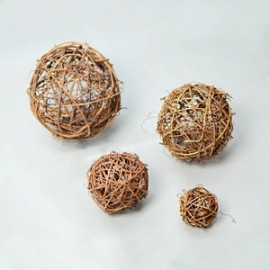 Macro shot of natural brown rattan balls in assorted sizes for DIY Christmas crafts